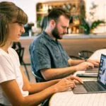 Photo of woman using laptop