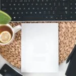 white printing paper near black computer keyboard